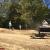 Chris, Matt, Josh and Gary compacting jumps.  Gary (on tractor)  put in many hours on the track build.  